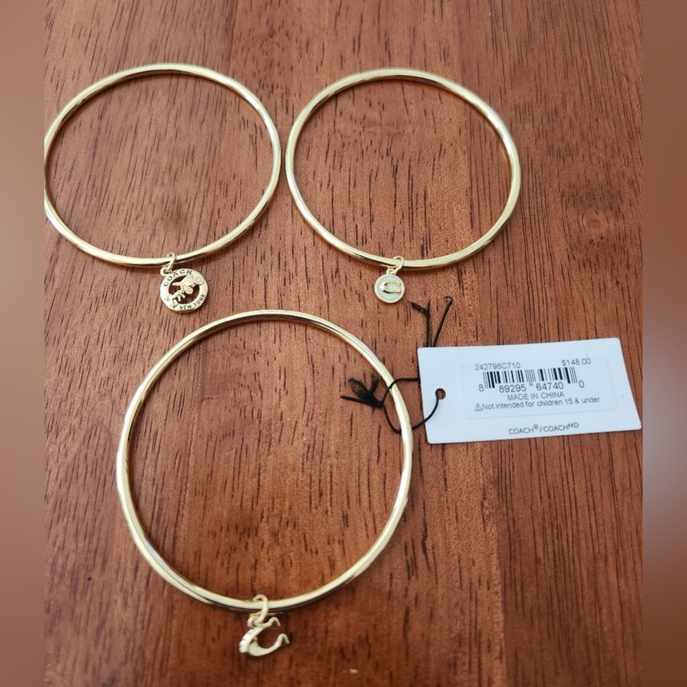 Brand New Coach Bangles With Charm.